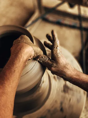 Fingers, clay, and the rhythm of the wheel.