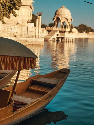 A wooden boat rests beside the waterfront.