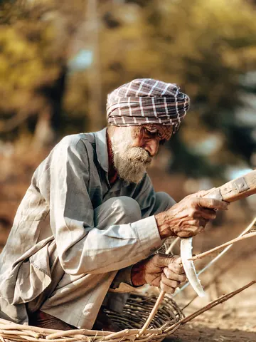 A basket takes shape, one strip at a time.