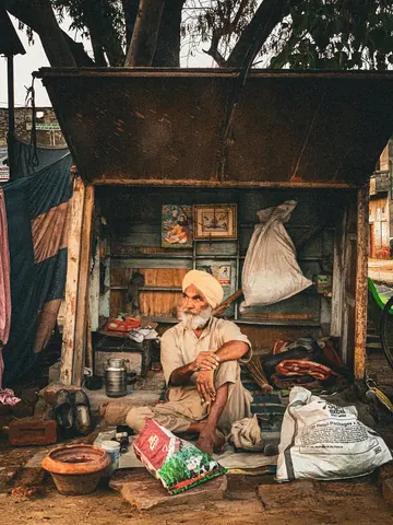 A roadside workspace filled with the tools of everyday work.