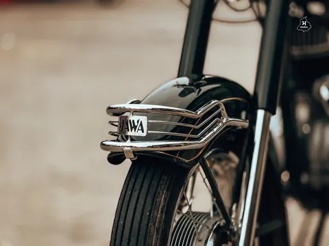 Chrome curves and the quiet character of an old motorcycle.